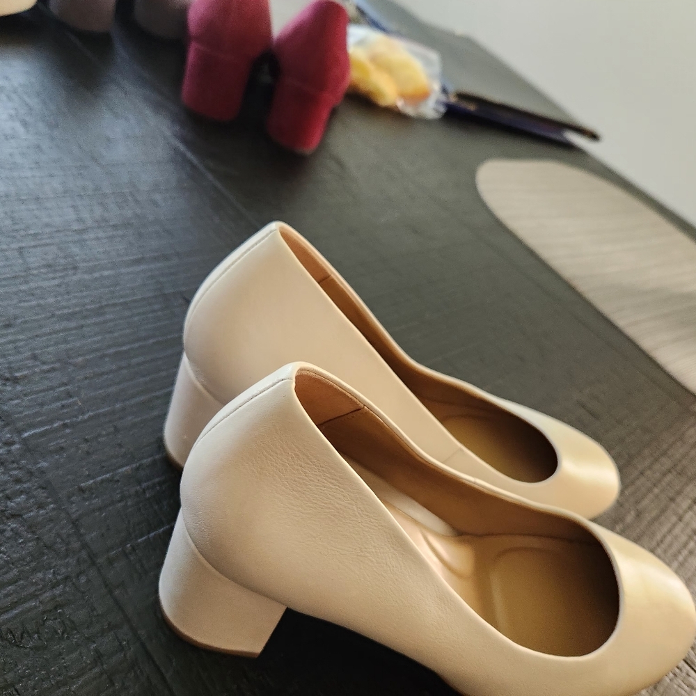 Cream colored pumps